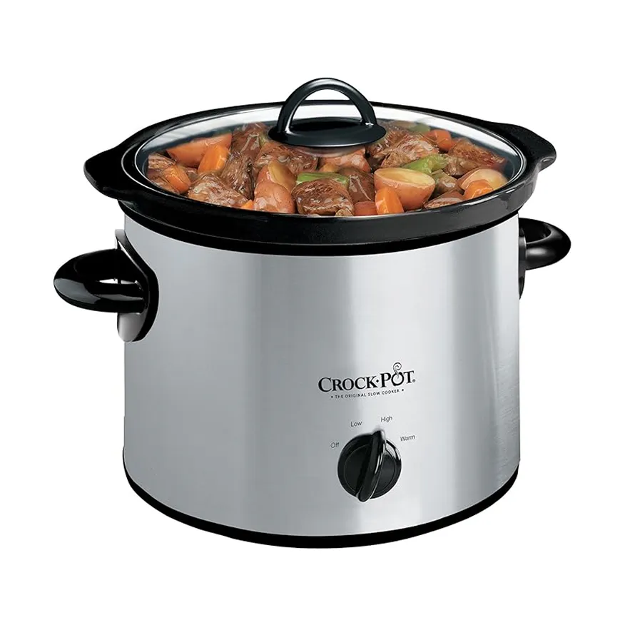 Stainless steel Crock-Pot slow cooker filled with beef stew and vegetables visible through glass lid.