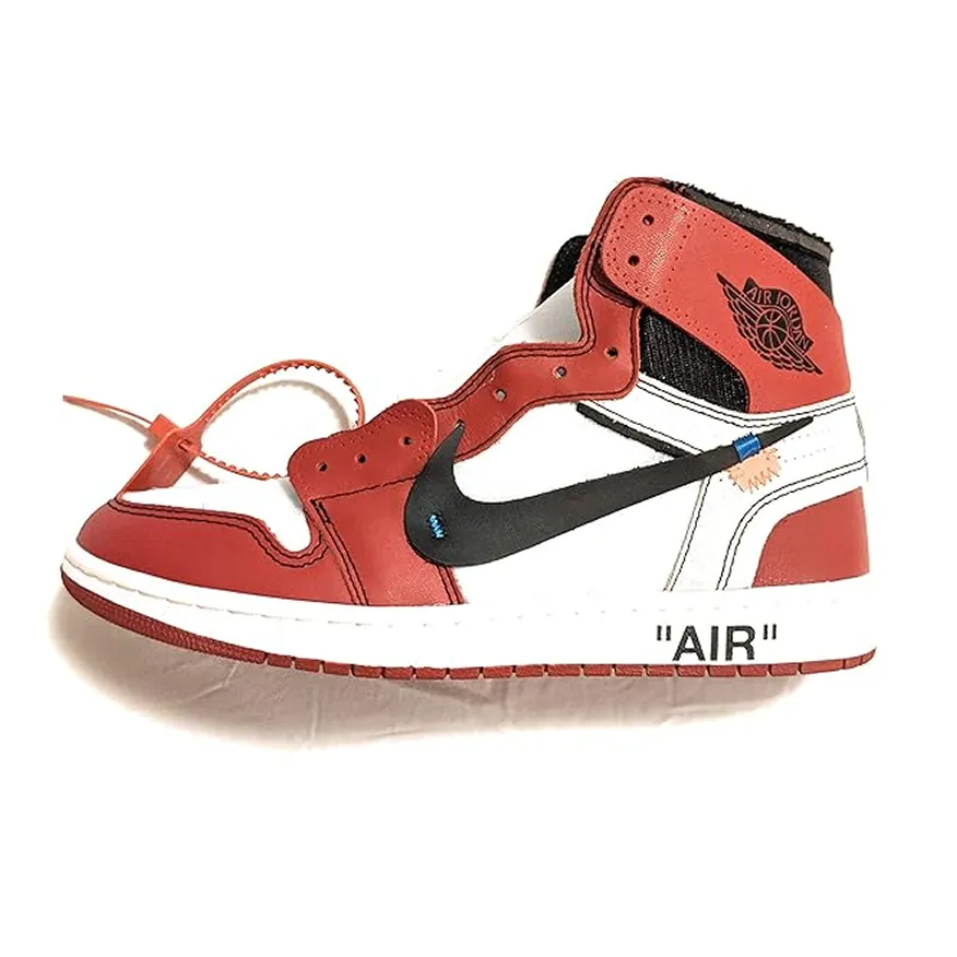 Red, white, and black Air Jordan sneaker with a black swoosh and the word 'AIR' printed on the midsole.