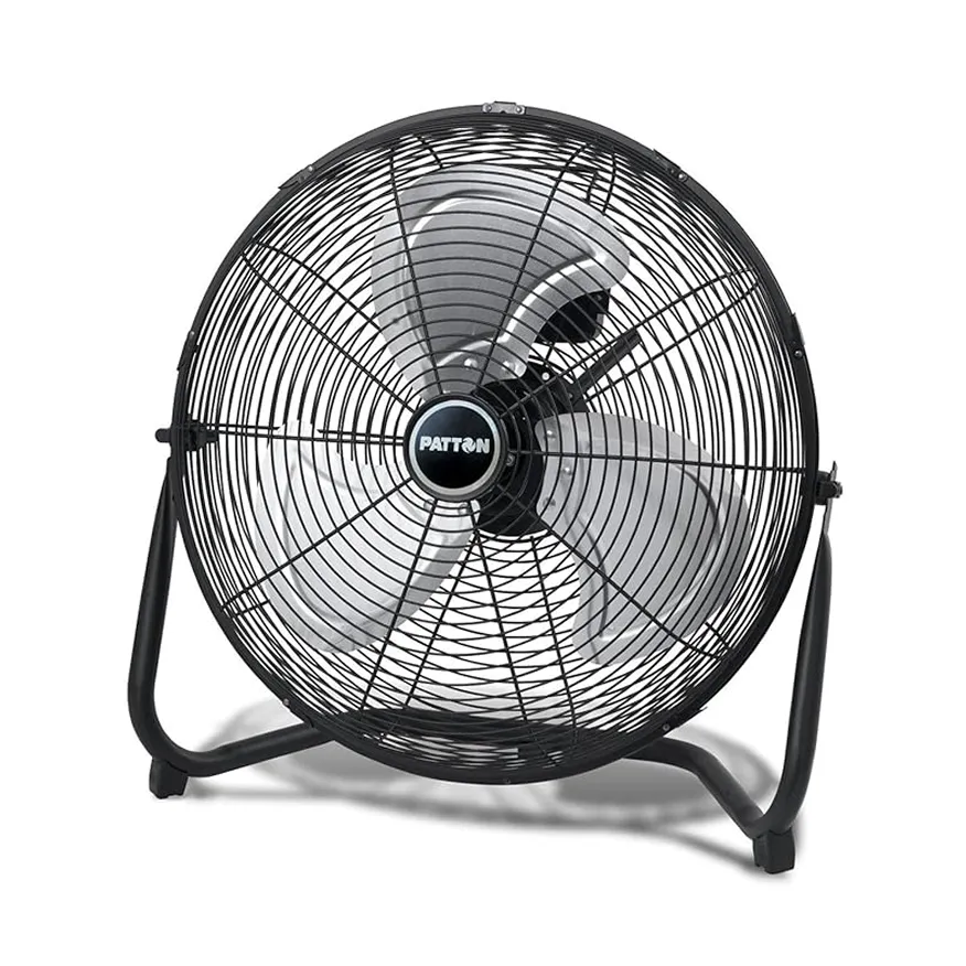 Black metal floor fan with three silver blades and mesh grill front, branded Patton.